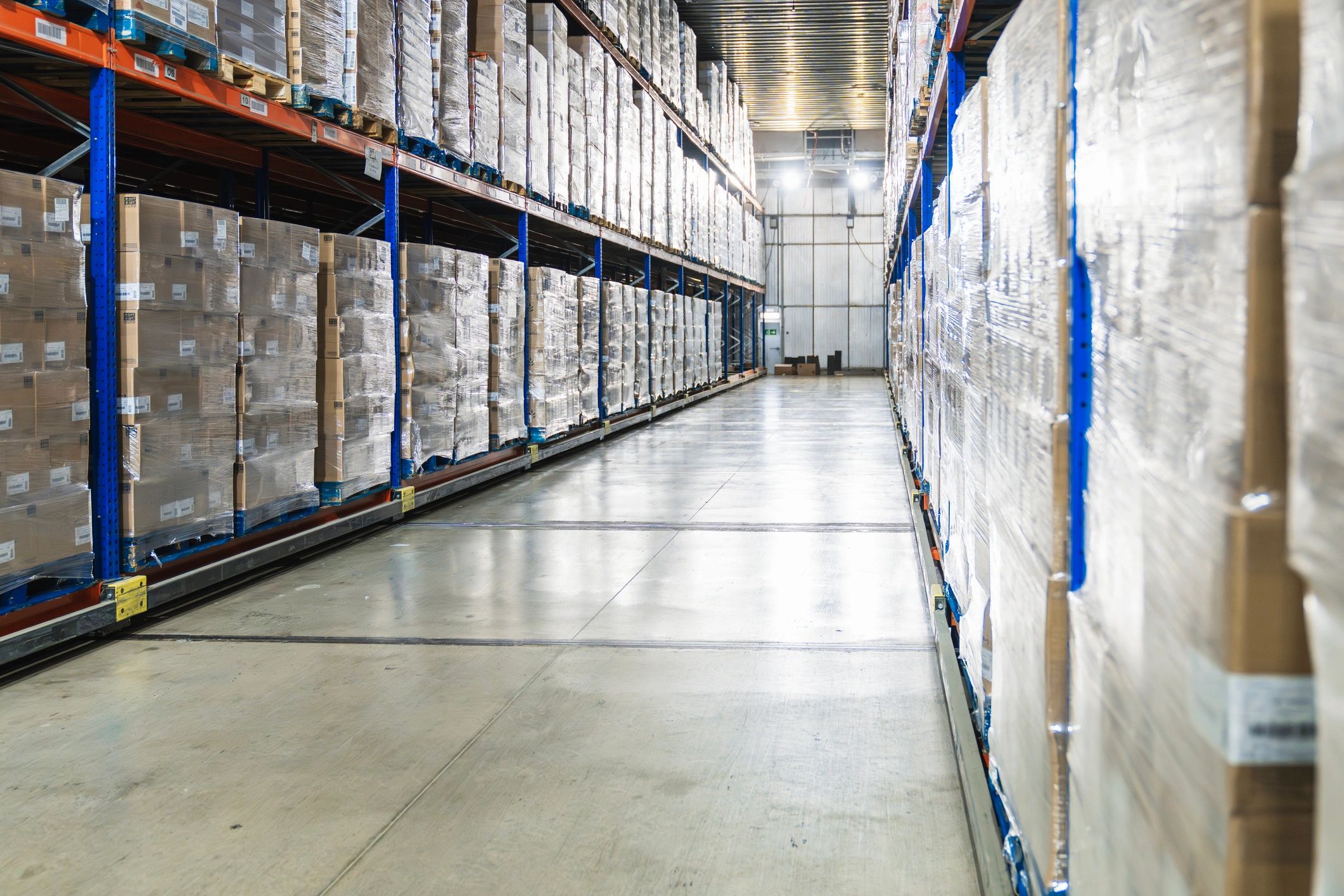 Palletized boxes staged in a logistics warehouse